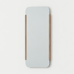 Rectangular mirror with wooden frame on a light beige background