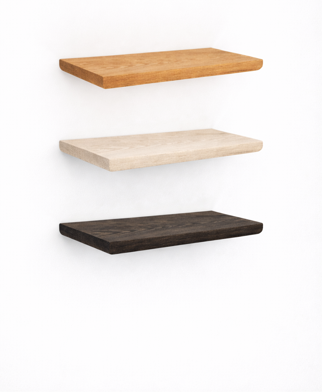 Three wooden shelves in different finishes on a white background