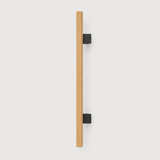 Wooden door handle with black brackets on a white background